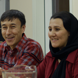 Afghan couple sharing a meal
